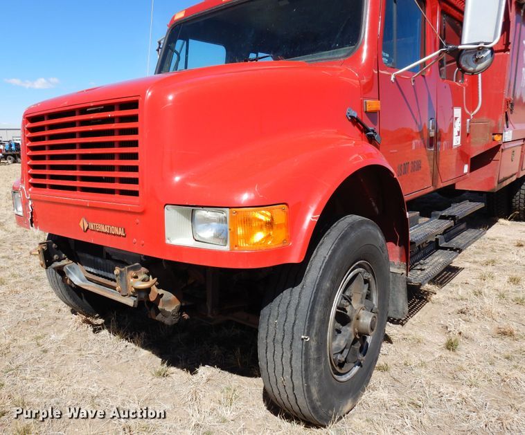 image for item DR1147 1990 International 4700  Crew Cab chipper truck