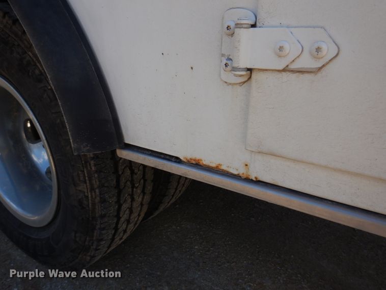 image for item IM9700 2012 Dodge Ram 3500HD  utility bed pickup truck