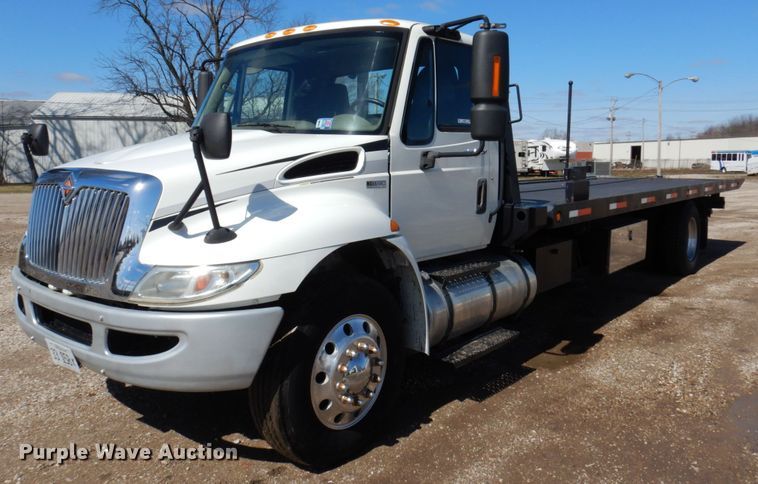 image for item IM9876 2013 International 4300  rollback truck