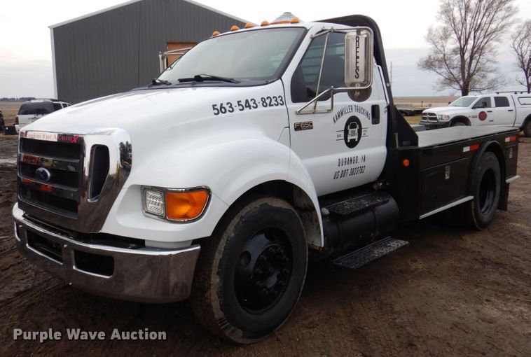 image for item IM9883 2011 Ford F650 Super Duty  flatbed truck