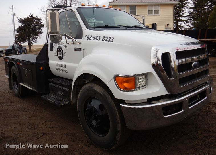 image for item IM9883 2011 Ford F650 Super Duty  flatbed truck