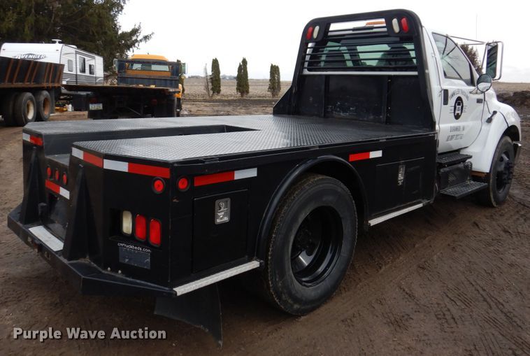 image for item IM9883 2011 Ford F650 Super Duty  flatbed truck