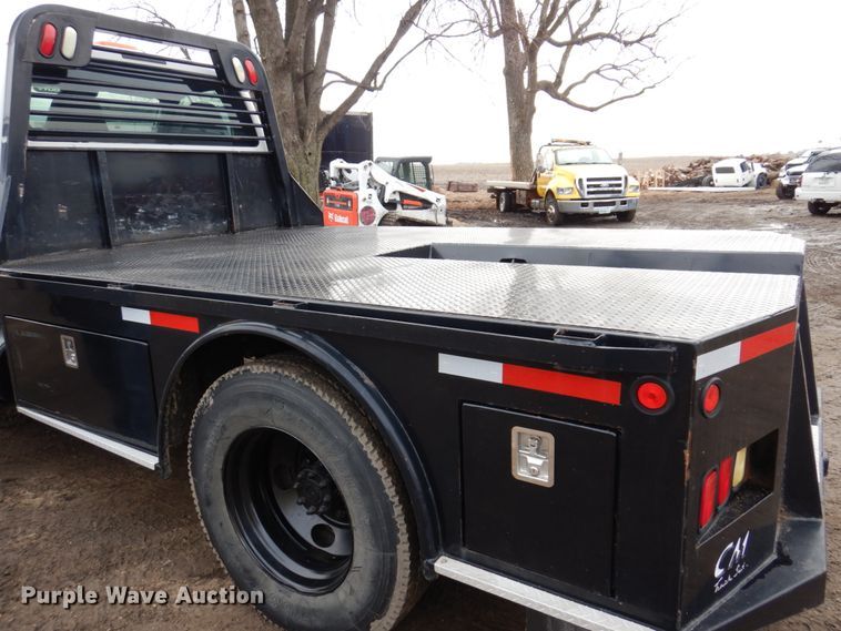 image for item IM9883 2011 Ford F650 Super Duty  flatbed truck