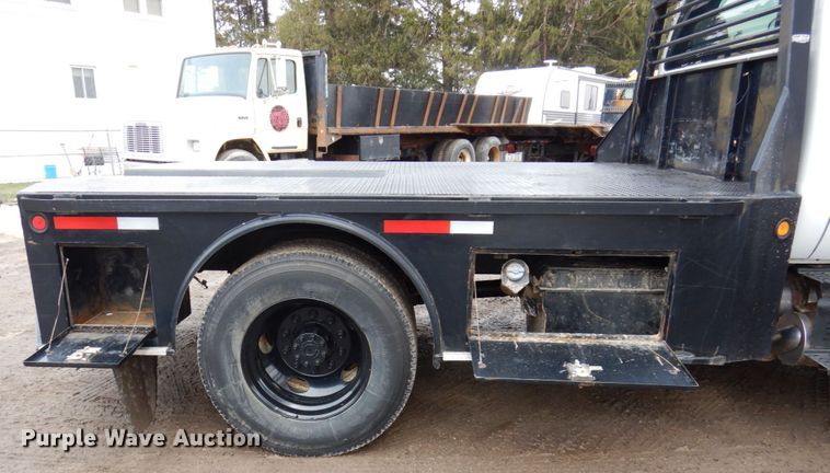 image for item IM9883 2011 Ford F650 Super Duty  flatbed truck