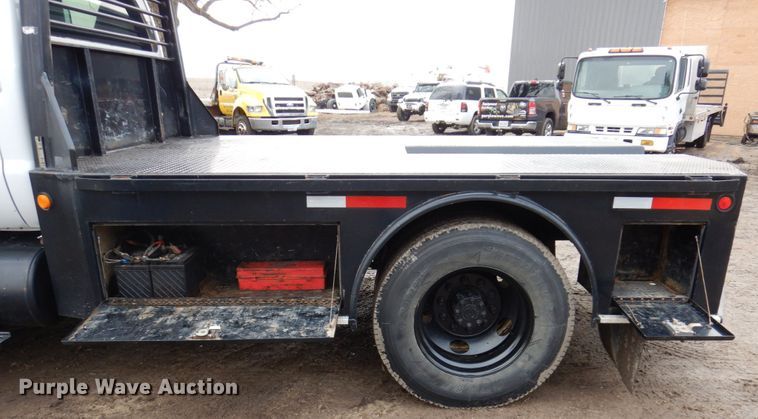 image for item IM9883 2011 Ford F650 Super Duty  flatbed truck