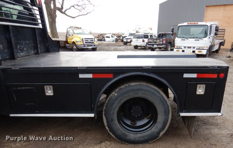image for item IM9883 2011 Ford F650 Super Duty  flatbed truck