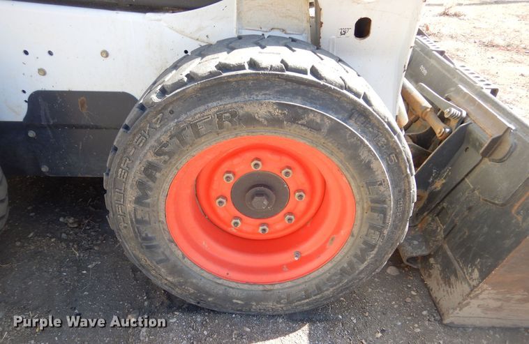 image for item MX9930 2015 Bobcat S570  skid steer loader