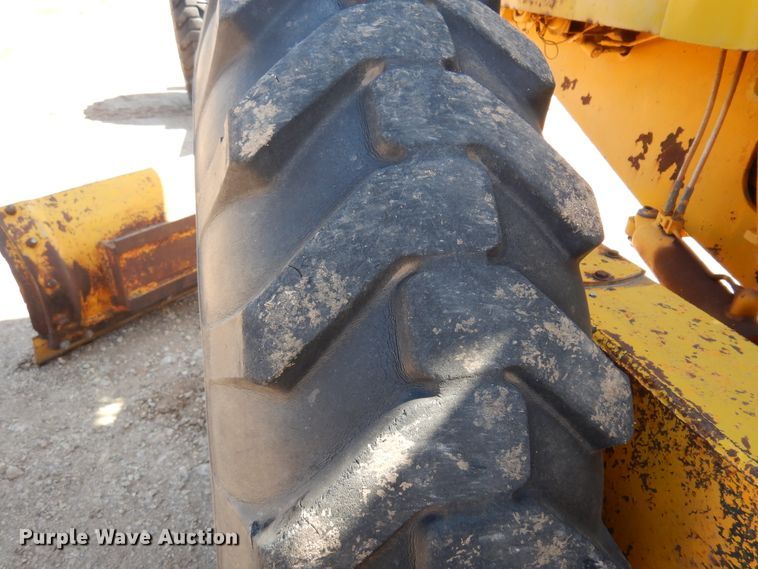 image for item DK4447 John Deere 570A  motor grader