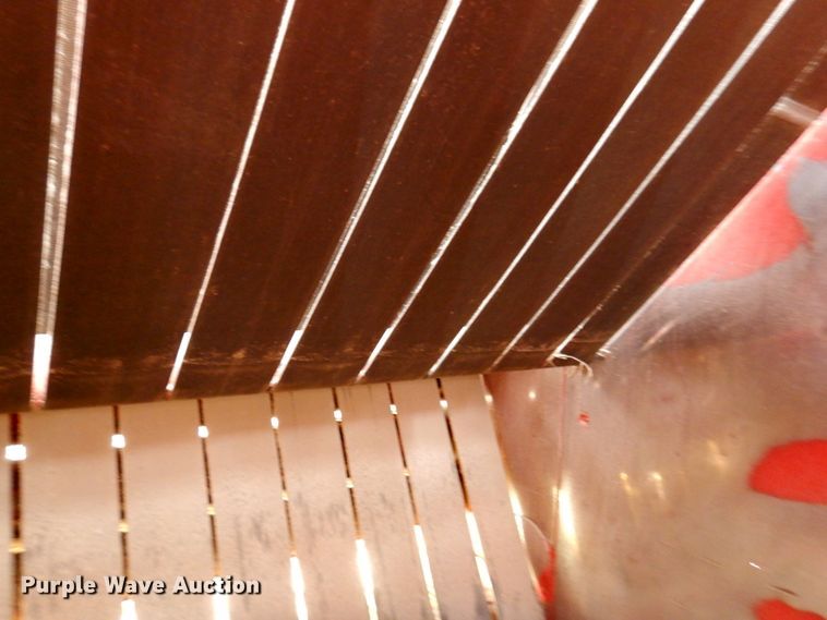 image for item DM6104 2017 New Holland Roll-Belt 560  round baler