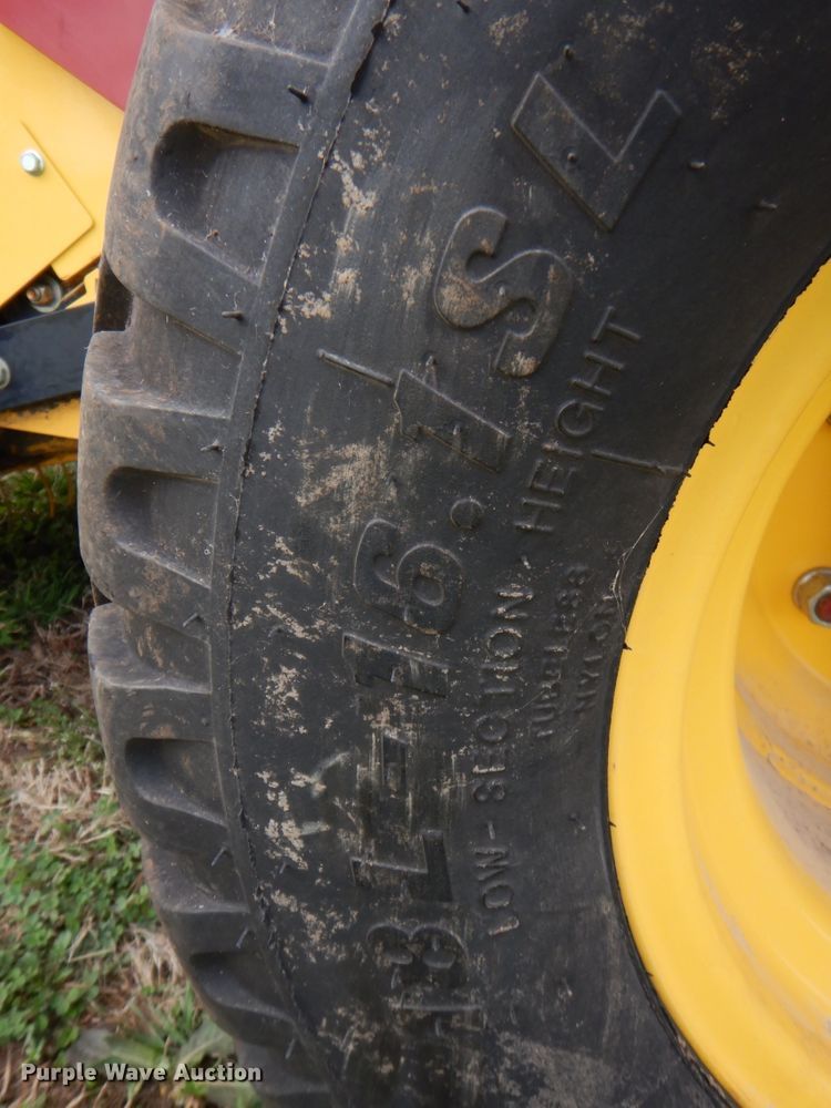 image for item DM6104 2017 New Holland Roll-Belt 560  round baler