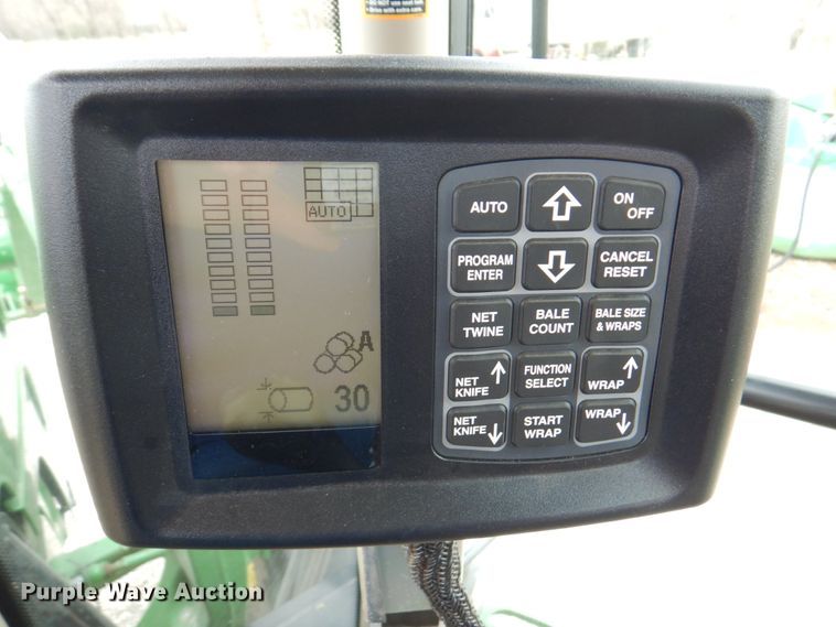 image for item DM6104 2017 New Holland Roll-Belt 560  round baler