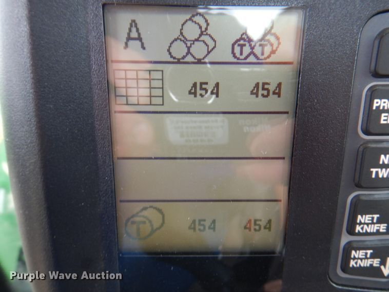 image for item DM6104 2017 New Holland Roll-Belt 560  round baler