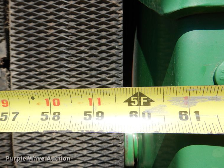 image for item KP9243 1998 John Deere 566  round baler