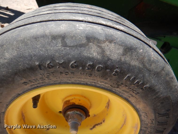 image for item KP9243 1998 John Deere 566  round baler