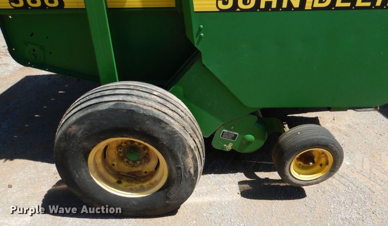 image for item KP9243 1998 John Deere 566  round baler
