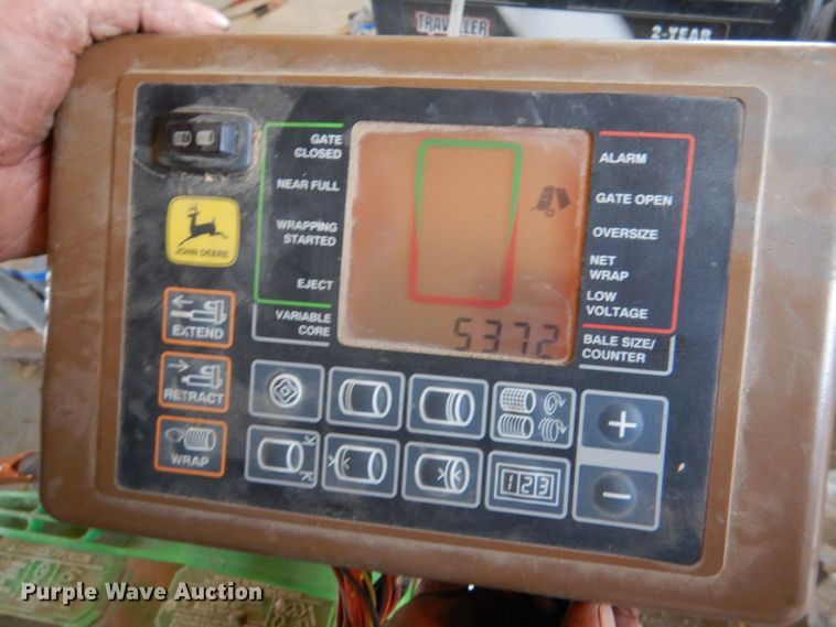 image for item KP9243 1998 John Deere 566  round baler
