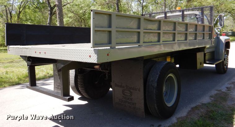 image for item DP3922 1985 Ford F700  dump flatbed truck