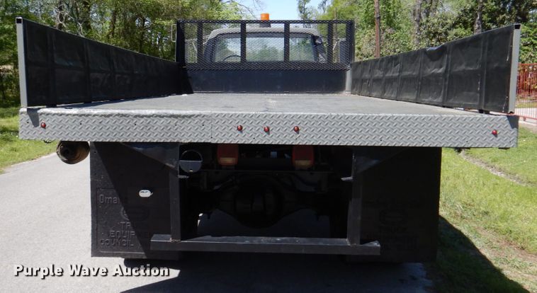 image for item DP3922 1985 Ford F700  dump flatbed truck