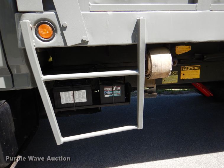 image for item DP3922 1985 Ford F700  dump flatbed truck