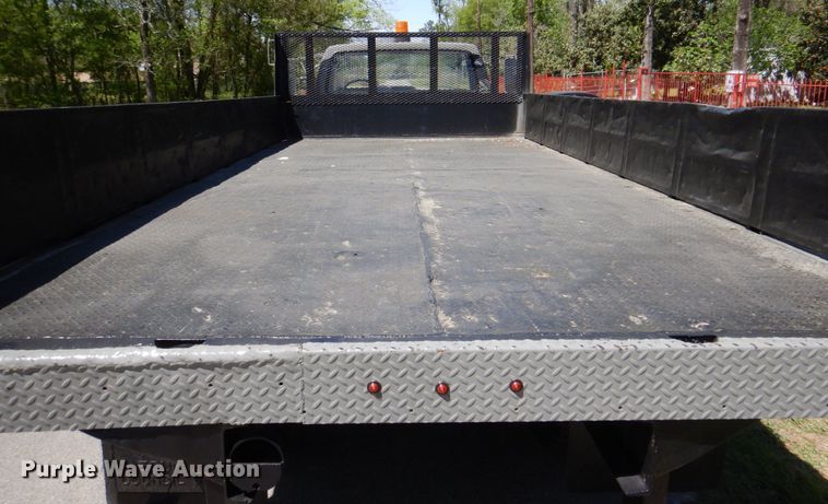 image for item DP3922 1985 Ford F700  dump flatbed truck