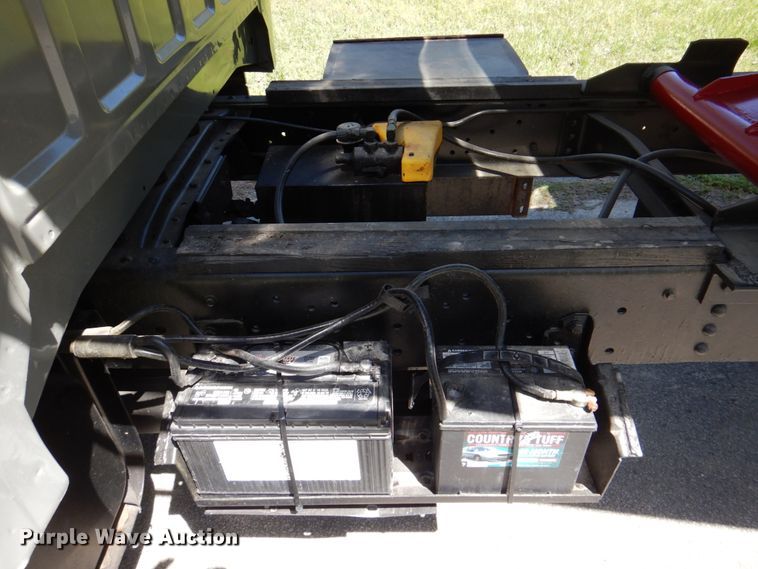 image for item DP3922 1985 Ford F700  dump flatbed truck