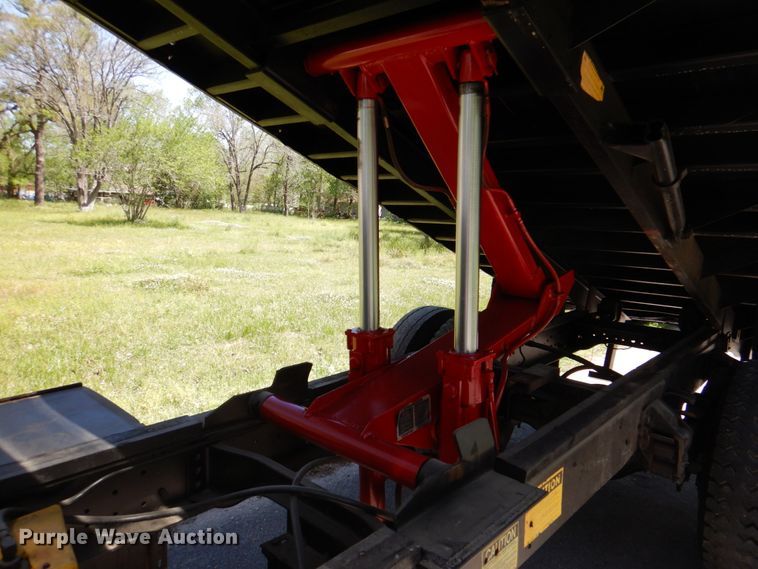 image for item DP3922 1985 Ford F700  dump flatbed truck