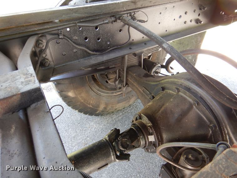 image for item DP3922 1985 Ford F700  dump flatbed truck