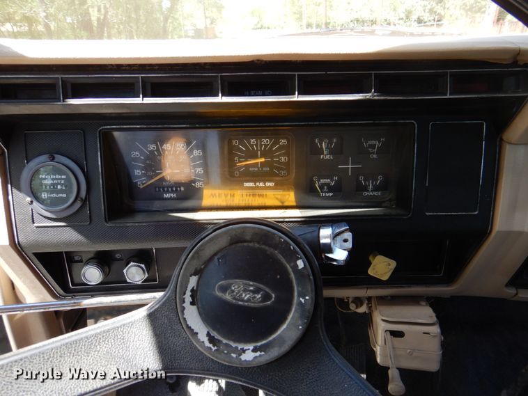 image for item DP3922 1985 Ford F700  dump flatbed truck