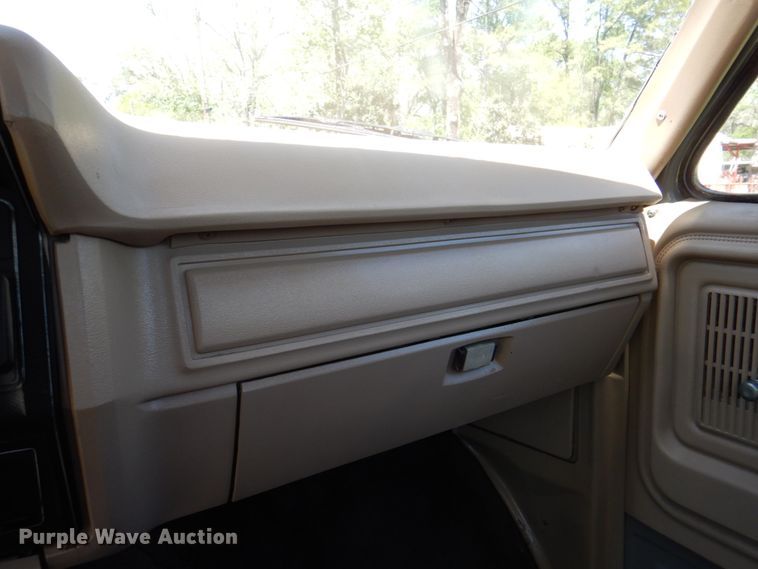 image for item DP3922 1985 Ford F700  dump flatbed truck