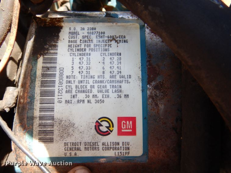 image for item DP3922 1985 Ford F700  dump flatbed truck