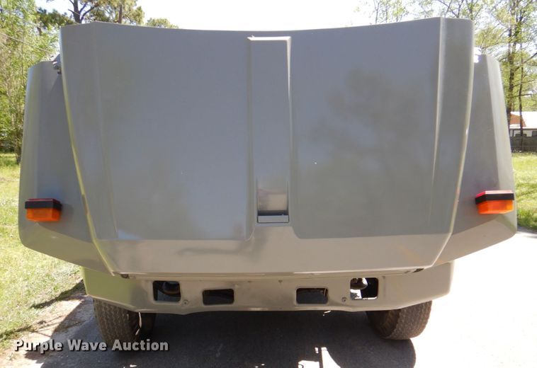 image for item DP3922 1985 Ford F700  dump flatbed truck