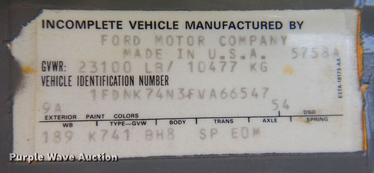 image for item DP3922 1985 Ford F700  dump flatbed truck