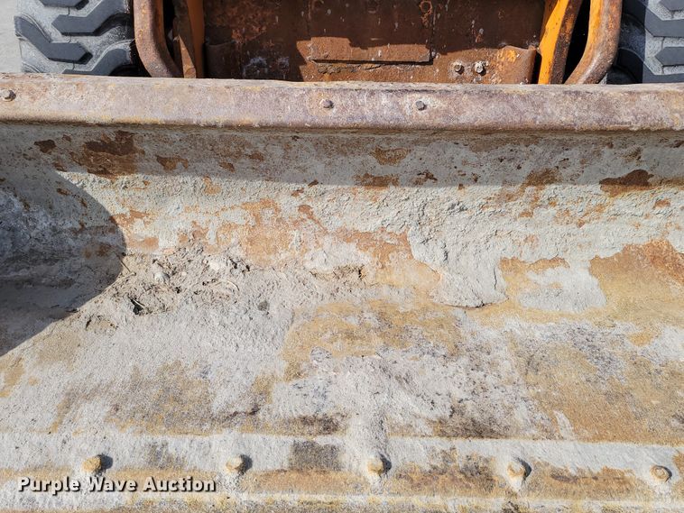 image for item DN7340 Case 450  skid steer loader