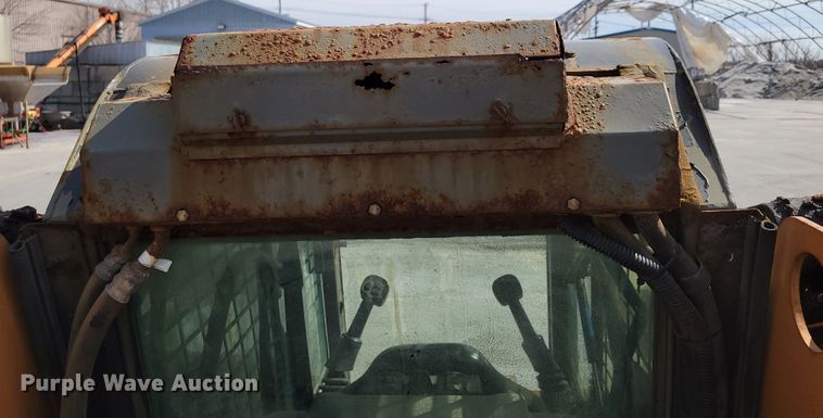 image for item DN7340 Case 450  skid steer loader