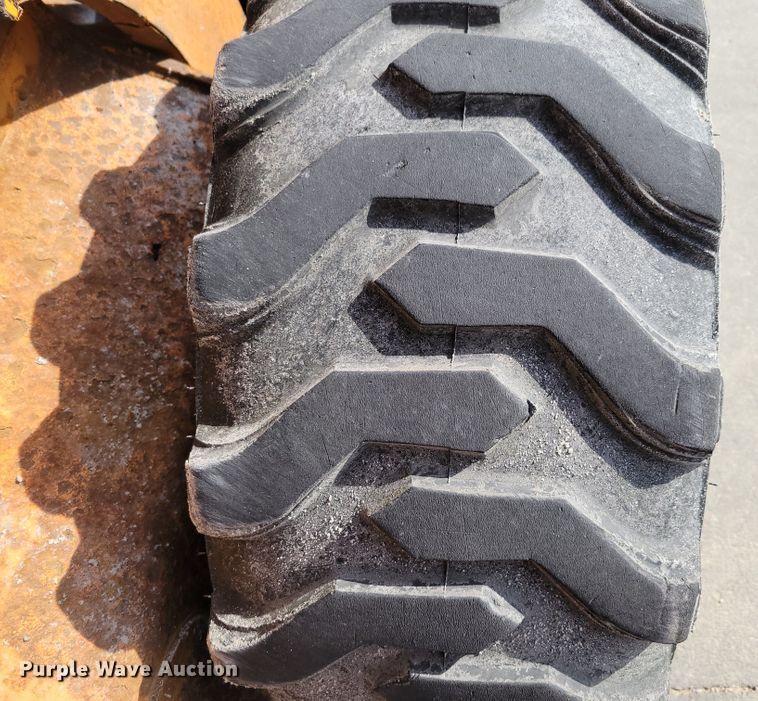 image for item DN7340 Case 450  skid steer loader