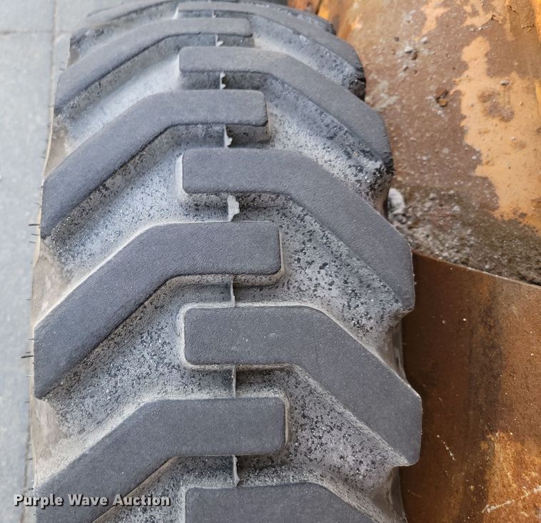 image for item DN7340 Case 450  skid steer loader