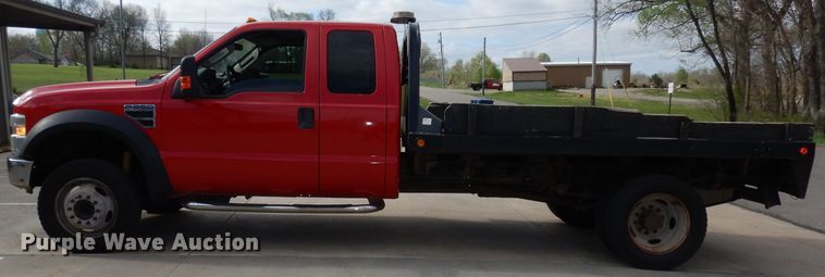 image for item DH8990 2010 Ford F550 Super Duty XLT  flatbed truck