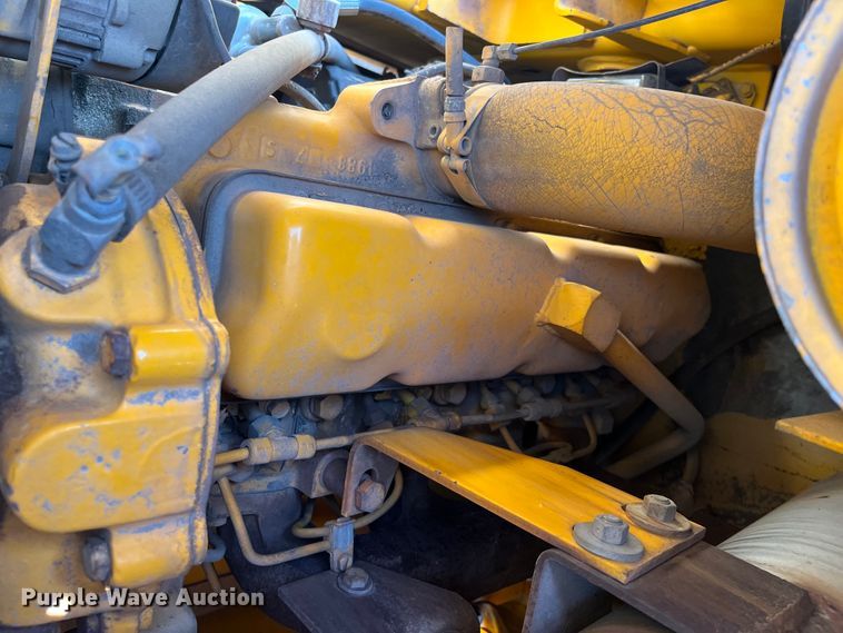 image for item DI1883 1989 John Deere 310C  backhoe