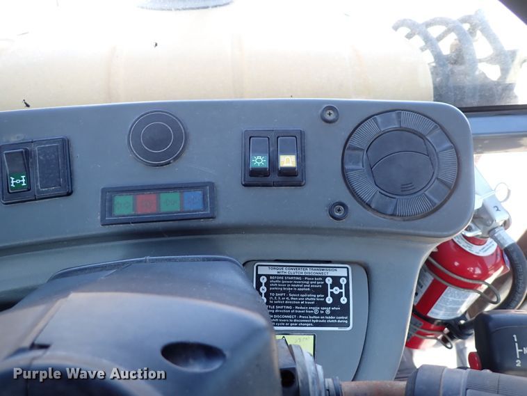 image for item DI1943 New Holland 555E  backhoe