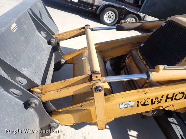 image for item DI1943 New Holland 555E  backhoe