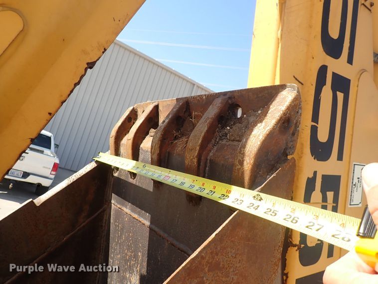 image for item DI1943 New Holland 555E  backhoe