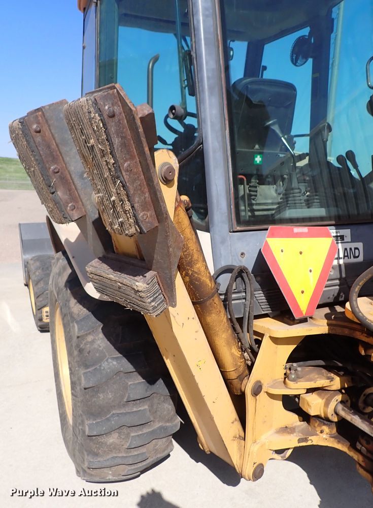 image for item DI1943 New Holland 555E  backhoe