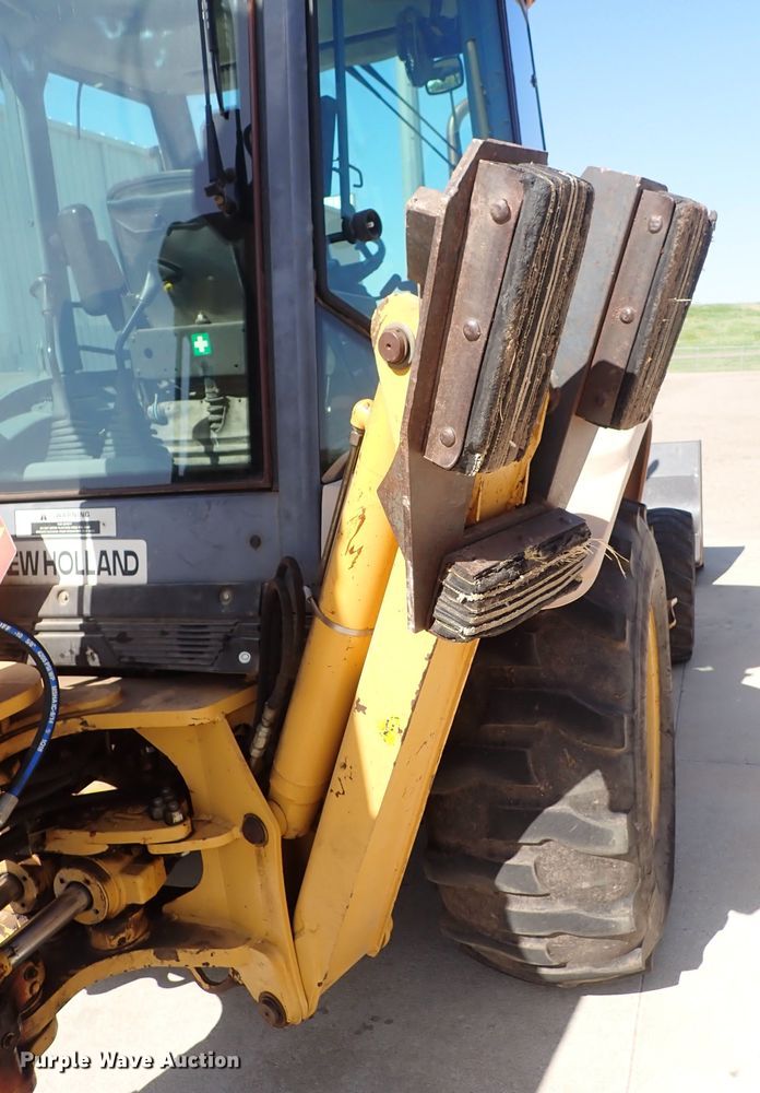 image for item DI1943 New Holland 555E  backhoe