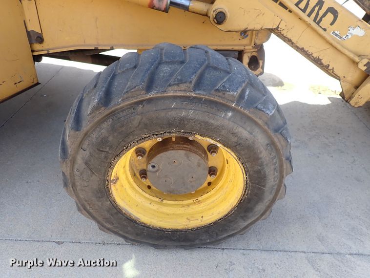 image for item DI1943 New Holland 555E  backhoe