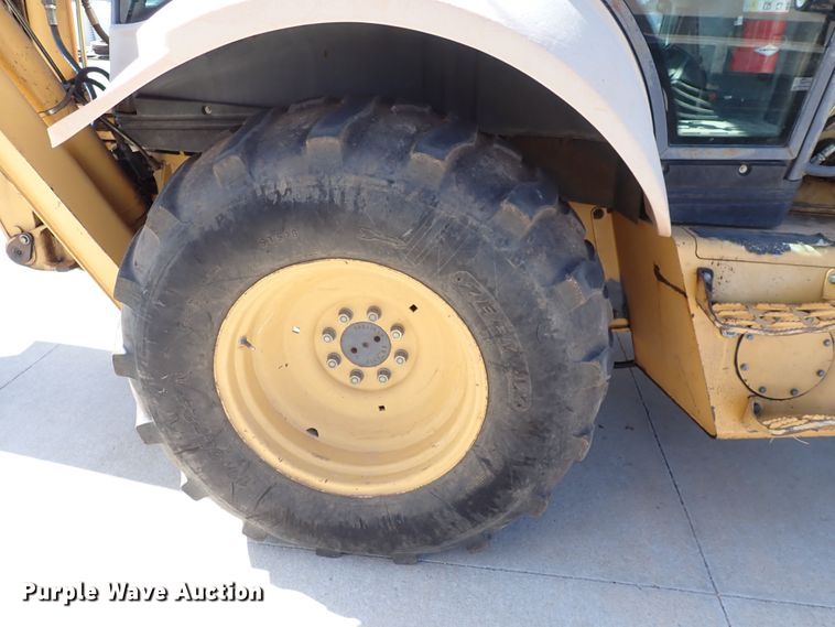 image for item DI1943 New Holland 555E  backhoe