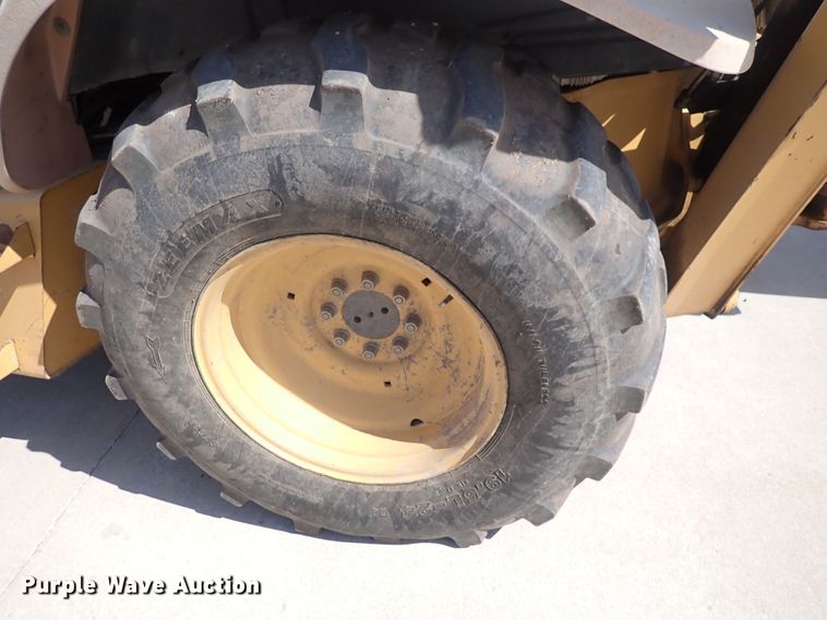 image for item DI1943 New Holland 555E  backhoe