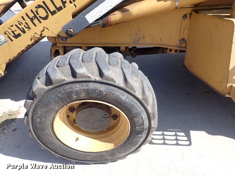 image for item DI1943 New Holland 555E  backhoe