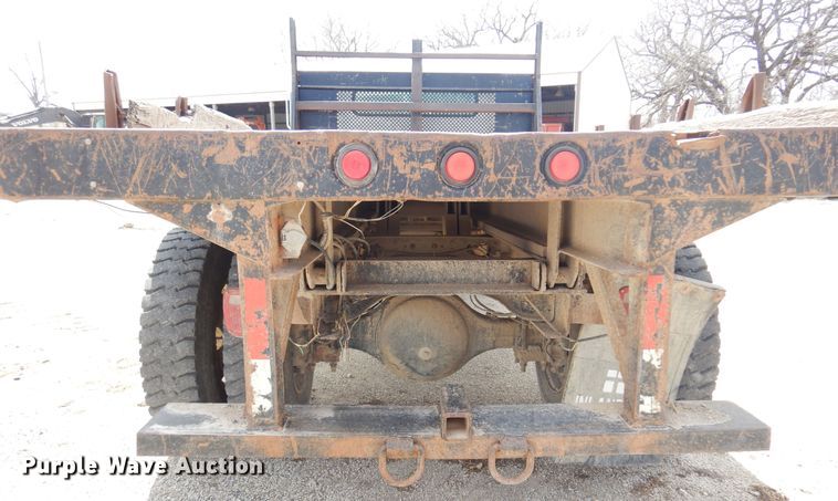 image for item DK0833 2000 International 4700  dump flatbed truck