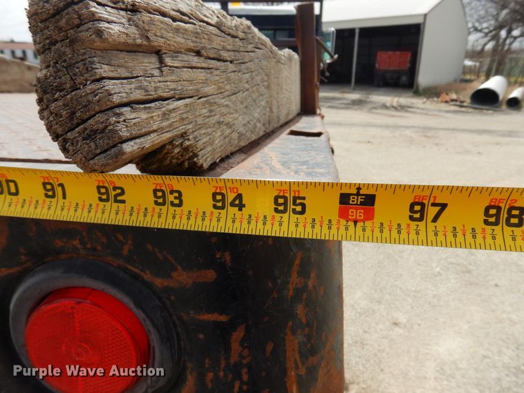 image for item DK0833 2000 International 4700  dump flatbed truck