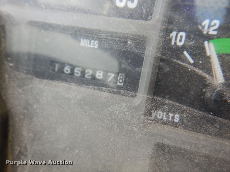 image for item DK0833 2000 International 4700  dump flatbed truck